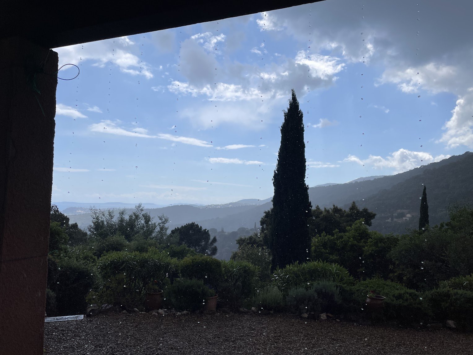 Looking out from the terrace, cypress and hills